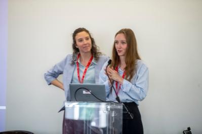 two presenters on stage